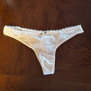 Lace trimmed white thong panties size small